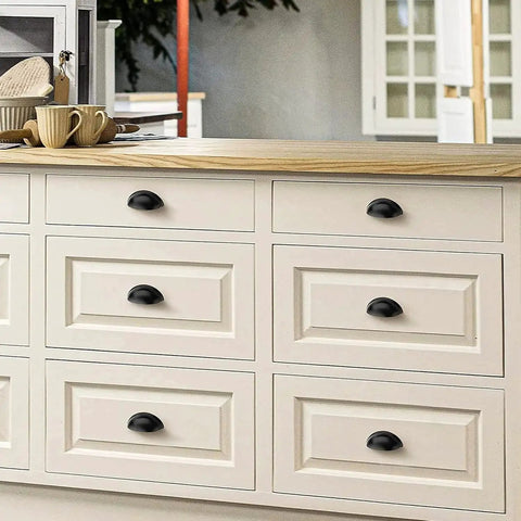 Kitchen island with Three Inch Cup Drawer Pulls Set Of Five In Flat Black Modern Kitchen Cabinet Handles Hardware installed.