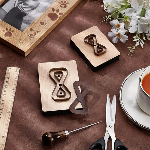 Leather Cutting Die Set 2 Piece 2 Styles With Wooden Die Molds Sharp Steel Blades Wallet Punching Dies And DIY Craft Stamping Tool On Smooth Wooden Base displayed with crafting tools