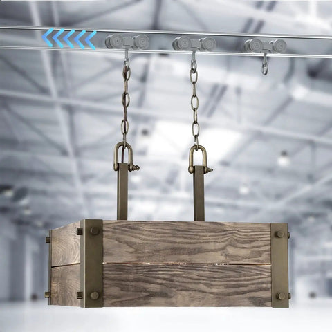 Installed Four Wheel Unistrut Trolley Assembly Kit with Silent M10 Bolt and Nuts on 1-5/8 inch Strut Channel, lifting a wooden box.