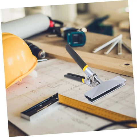 Beefy Multi-Functional Hand Seamer Tool With Electric Edge Folding Pliers on workshop table with construction plans and hard hat