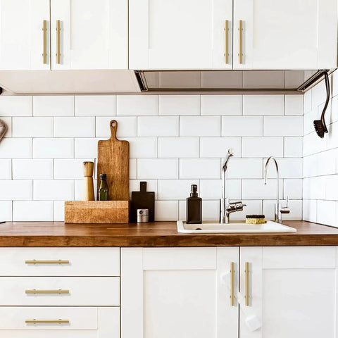 3 Inch Solid Brass Cabinet Pulls Round Bar Handles Brushed Gold 4 Pack installed on kitchen cabinets