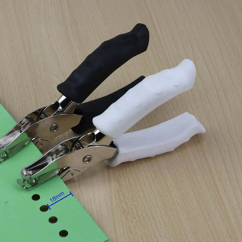 Handheld Circle Hole Puncher One Quarter Inch With Soft Grip Handle for paper crafts, shown in black and white handles