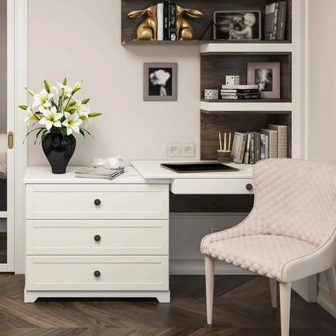 White dresser with Ten Pack One And One Quarter Inch Matte Black Round Cabinet Knobs Zinc Solid Drawer Pulls in a stylish room.