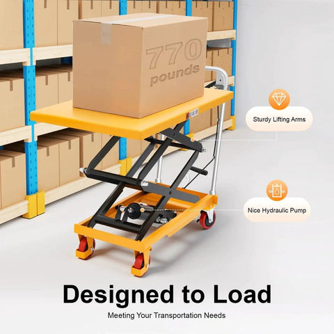 Front view of orange hydraulic lift table cart with black scissor mechanism and four caster wheels in warehouse
