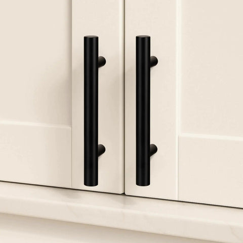 Solid Brass Cabinet Pulls 4 Pack Matte Black Euro T Bar Handles With 5 Inch Hole Center installed on white cabinet doors