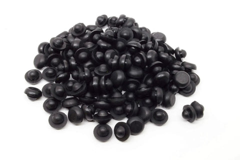 Pile of black Ridged SBR Rubber Push In Bumper One Half Inch Diameter Five Thirty Second Inch Height Fits One Quarter Inch Hole
