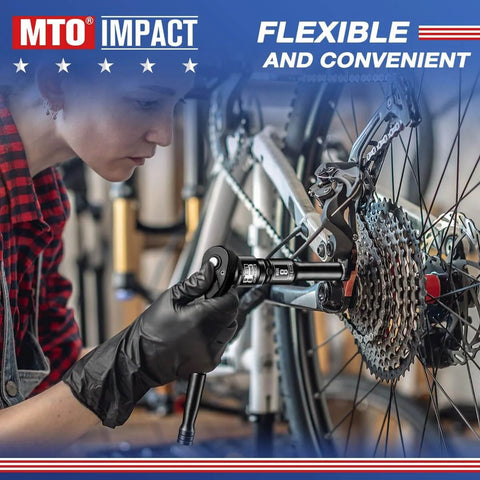 Person using four piece impact socket adapter and reducer set for one quarter, three eighths, and one half inch drives on a bike