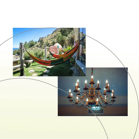 Outdoor colorful hammock hanging beside a house in a hilly landscape and an ornate indoor chandelier with lit candles.