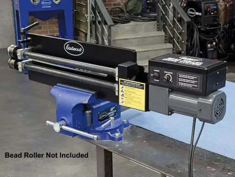 Bead Roller Drive System With 1/6 HP 120V Motor, Variable Speed 0 To 20 RPM, And Foot Pedal Control attached to a workbench