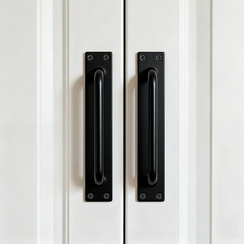 Beefy 12 Inch Heavy Duty Steel Barn Door Handles Black Powder Coat 2 Pack installed on white door