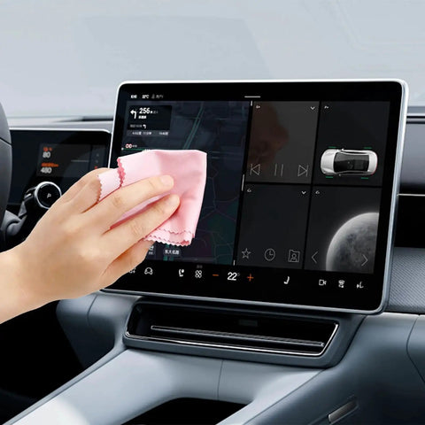 Person cleaning car touchscreen with pink cloth from 300 Microfiber Cloths 6x7 Inch For Glasses Cameras Phones Screens Assorted Colors.