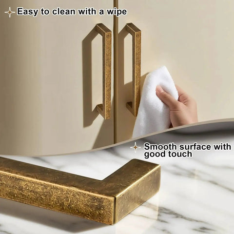 10 Pack Antique Brass Cabinet Pulls Square Design With Five Inch Center to Center About Five and Two Fifths Inches Long Solid Zinc Alloy Kitchen Cabinet Handles Polished Gold Drawer Pulls Hardware being cleaned with a cloth.