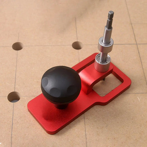 Pro Grade Vertical Hole Drilling Jig For Woodworking Projects With Boss Level Precision, red aluminum body on wood surface