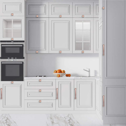 Brushed Antique Copper Kitchen Cabinet Pulls And Knobs Set, 5 Inch, Square Zinc Alloy Drawer Handles For Dresser, 5 Pack With Classic Finish For Farmhouse And Modern Cabinets By GRANTENOV installed in a modern white kitchen.