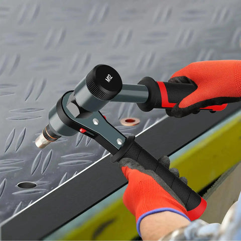 Rivet Nut Tool Kit With Ratcheting Mechanism And Quick Change Mandrels For Fast Installations Includes 10 Metric And SAE Mandrels 100 Rivet Nuts Assortment In Rugged Carrying Case Pro Grade being used on a metal surface.