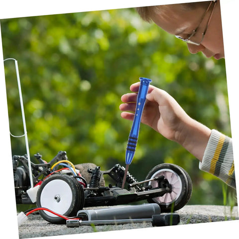 Child using RC Car Repair Tool Kit With Wrench, Screw And Fastener Set, Nut And Bolt Assortment, Durable Iron Tools on RC vehicle