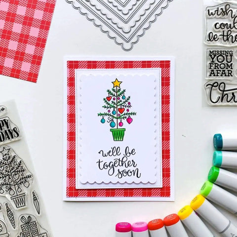 Rectangle Frame Metal Die Cuts Set With Scalloped Edges And Stitched Nesting Tags for DIY Scrapbooking on a Christmas card display.