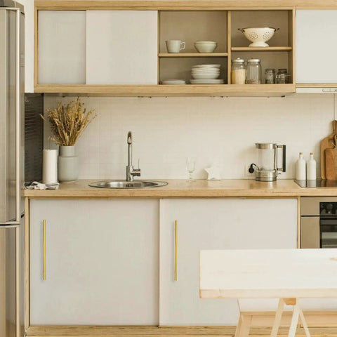 Modern kitchen with Brushed Gold Cabinet Handles 10 Inch Set Of 5 Stainless Steel Drawer Pulls installed, sleek design.