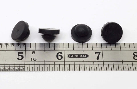 Push In Ridged SBR Rubber Bumper Foot Black, 9/16 Inch Diameter, 1/8 Inch Height, shown with ruler for scale