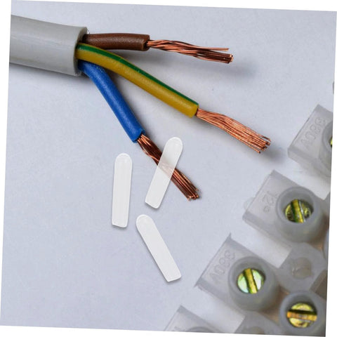 Clear Plastic Screw Covers End Caps Set For Thread Protection And Cable Shielding near exposed copper wires and connectors.