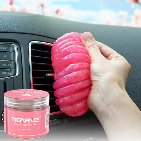 Car Cleaning Gel Detailing Putty For Auto Interiors And Grime Removal Dust Crumbs Pet Hair In Nooks And Crannies Easy To Use Rose Red 160g in hand near car air vent.