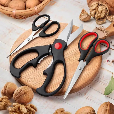Boss All Purpose Kitchen Scissors 3 Pack Set for Poultry Fish and Vegetables displayed on wooden board with walnuts
