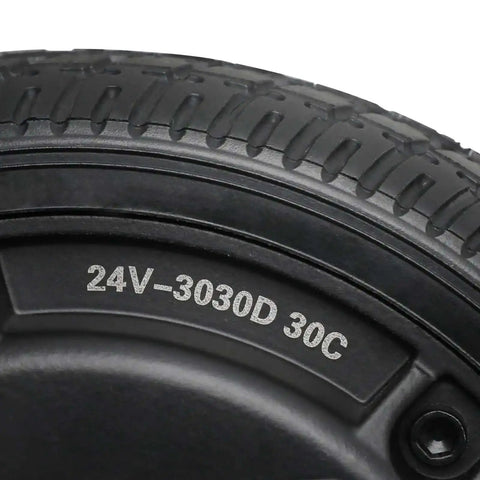 Close-up of 24V 250W Gearless Brushless Hub Motor with 6.5 inch solid tire wheel for scooter, showing tire details.