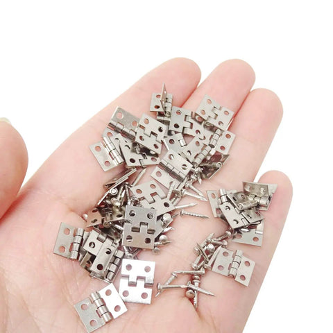Miniature Dollhouse Hinges Set With 200 Screws For Tiny Cabinets Drawers And Jewelry Boxes Brass Hinges Silver Tone Finish 50 Count 8x10mm Holes 1.5mm shown on hand