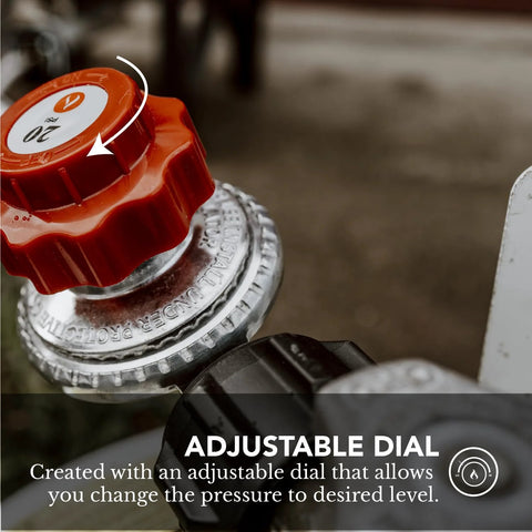 GasOne 2113 adjustable propane regulator with red dial set to 0-20 psi attached to chrome gas valve on a grill setup
