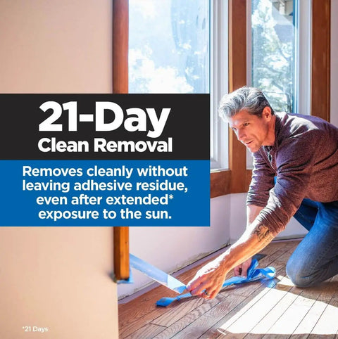 Person using PROSharp Painter's Tape 1.5 in x 60 yd, 3-Pack - Edge-Lock+ for Sharp Paint Lines on wall, tear-resistant blue tape