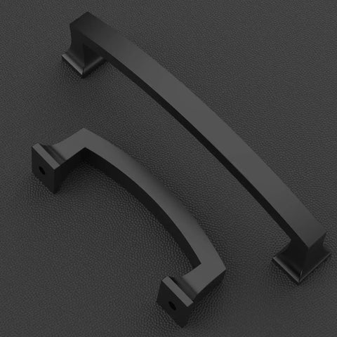 Two matte black cabinet pulls displayed on a textured surface, focus on 4-inch size, pack of 10, kitchen hardware, durable metal construction.