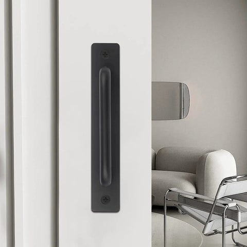 4 Pack Black Zinc Alloy Barn Door Handles Set With Mounting Plates installed on a white sliding door in a modern living room.