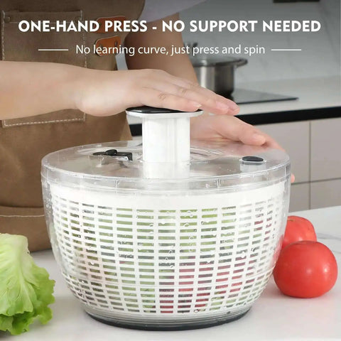 Person using Big Ol 6.3 Qt Salad Spinner with fully removable lid, one-hand press pump, instant stop brake, and retractable handle.
