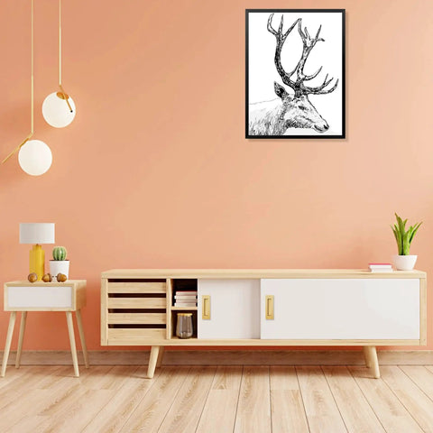 Modern living room with orange walls, mid-century sideboard, pendant lights, and a framed deer sketch on the wall.