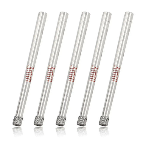 Diamond Hole Saw Set For Glass Tile Marble Ceramic Granite Quartz Gemstone With Twelve Pieces One Eighth Inch Shank Five Millimeter Cutting Depth Diamond Drill Bits By Luomorgo No Fuss Easy Cut Crack Free Drilling And Long Lasting Performance, showing a row of diamond drill bits with 1/8 inch shanks.