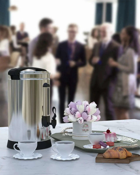 Heavy Duty 18 Liter Coffee Urn That Brews 120 Cups Stainless Steel Commercial Coffee Maker And Electric Hot Beverage Dispenser For Catering And Events Ultra Large Capacity For Offices Restaurants Churches Parties on a table at an event