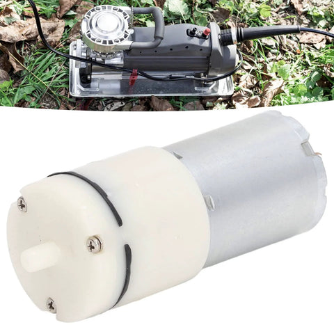Miniature 6V vacuum pump with aluminum body and white end cap; outdoor setup and close-up motor view