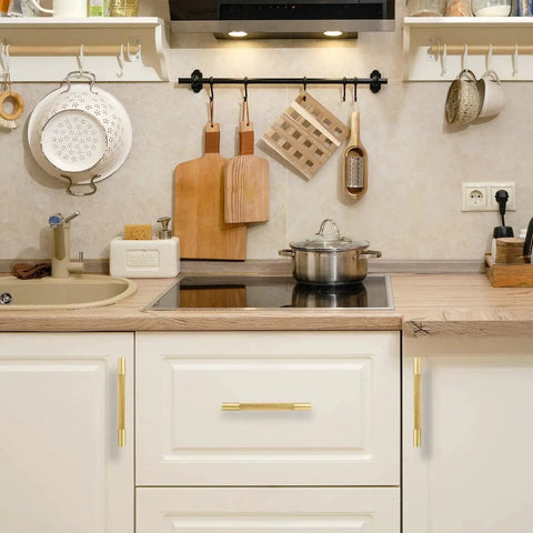 Four Pack 3 Inch Solid Brass Cabinet Pulls In Brushed Gold Finish on kitchen drawers