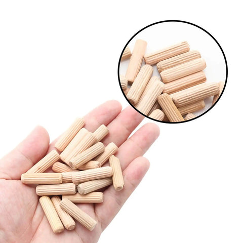 48 Pcs Wood Dowel Pins 8 Mm By 30 Mm And 0.3125 Inch By 1.18 Inch Fluted Beveled Ends Dowels shown in hand