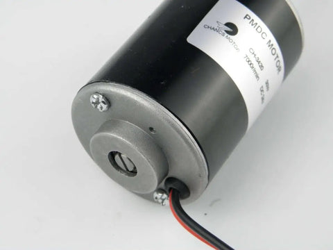 Close-up of a 12V High Speed Permanent Magnet DC Motor 3500RPM Reversible CW CCW Low Noise with all metal construction and dual threaded outlet.
