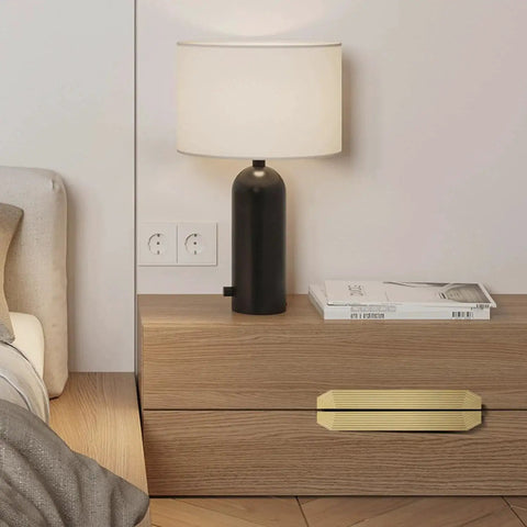 Brushed Gold Cabinet Pulls 9.75 Inch Polygon Drawer Handles on wooden dresser, modern bedroom setting