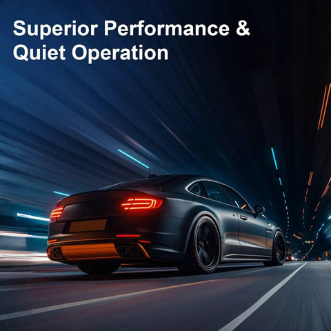Black sports car driving fast in a tunnel at night with glowing tail lights, showcasing superior performance and quiet operation.