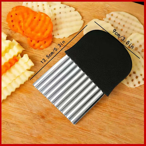 Close-up of crinkle fry cutter with non-slip handle on wood surface, part of Two Pack Crinkle Fry Cutter Set For Potatoes And Veggies