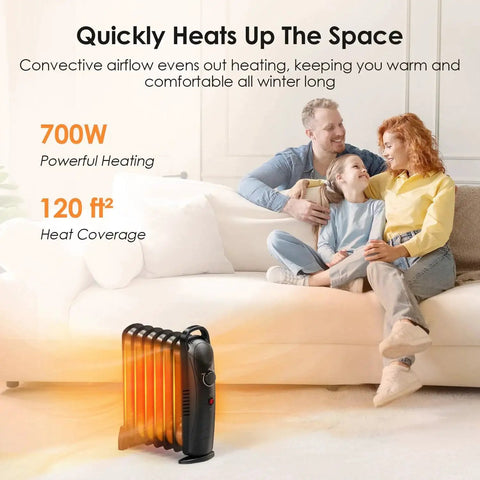 Family sitting on sofa with Efficient 700W Oil Filled Radiator Heater For Indoor Use With Adjustable Thermostat And Two Heat Settings Ultra Quiet Overheat Protection Small Space Heater For Bedroom Office Desk Black From Air Choice on floor.