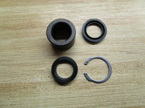 Hydraulic Seal Kit R432015242 P-068148-K0000 components for Rexroth Bosch pumps cylinders, O-rings, gaskets on wooden surface