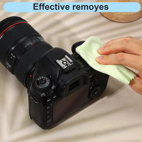 Hand using a microfiber cloth to clean a camera, 300 Microfiber Cloths 6x7 Inch For Glasses Cameras Phones Screens Assorted Colors