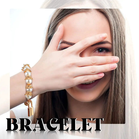 Close-up of woman's hand wearing bracelet with 200 Piece Mini Crown Charms For Jewelry Making Colorful Gold And Silver Mixed Metals Large Hole Spacer Beads Bulk Pack For DIY Crafts And Jewelry Projects Great For Bracelets Necklaces And Earrings