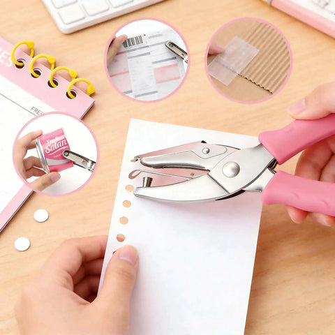 Two Piece Hole Punch Set Circle Punches One Quarter Inch And One Eighth Inch With Pink Soft Grip Handles used on paper