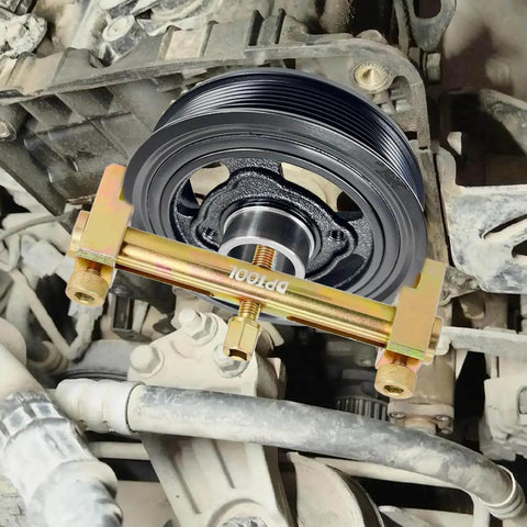 Universal Ribbed Drive Belt Pulley Puller And Crankshaft Pulley Removal Tool installed on car engine