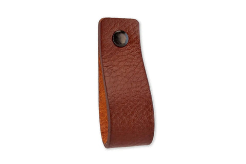 Leather Furniture Handles Set Two Pieces Cognac Leather Drawer Pulls For Cabinets Dressers Kitchen And Bathroom Wood Furniture Six And A Half Inch Length Featuring Durable Craftsmanship And Industrial Style Accents For Modern Homes; close-up front view showing texture and single screw hole